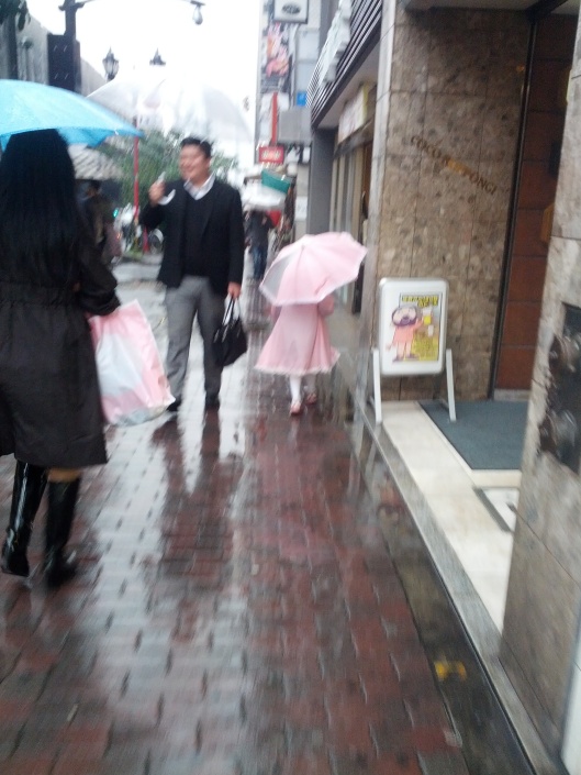 in other news - how cute is this girl in her rain outfit